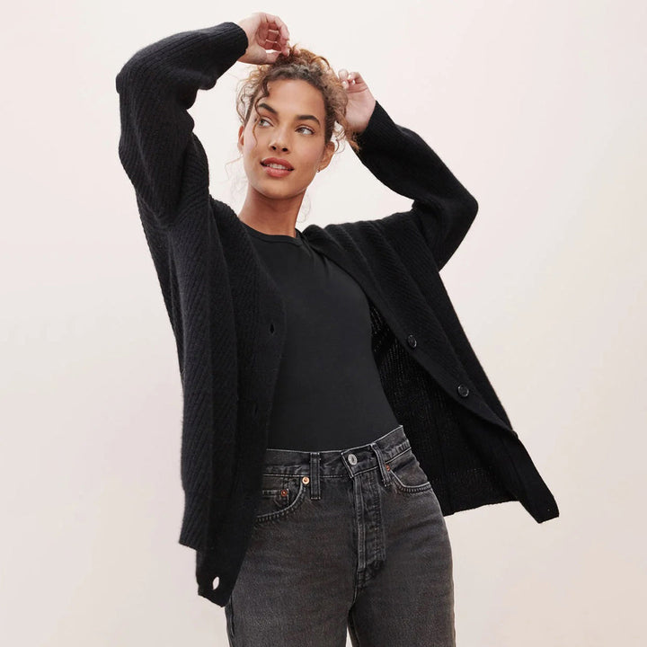Oversized women's cardigan, a comfy knitwear jacket for casual wear & winter warmth.