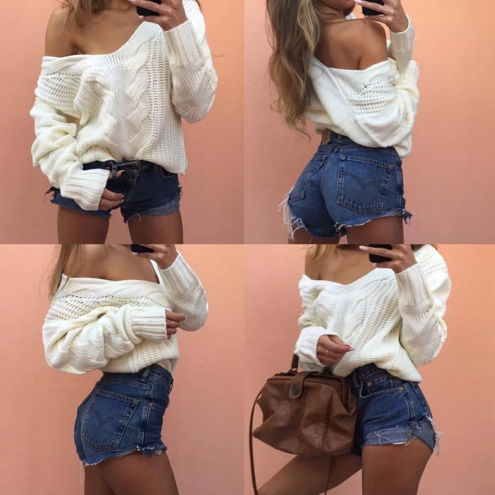 Women's oversized long sleeve knit sweater, round neck, offering cozy and relaxed winter style & comfort.