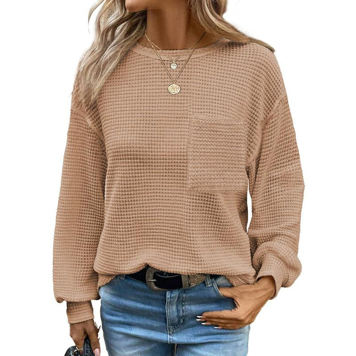 Soft knit women's oversized long sleeve crewneck blouse, a comfortable top for relaxed everyday style.