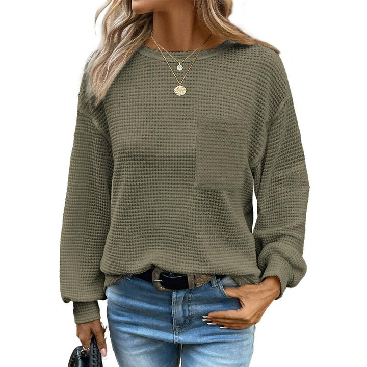 Chic women's oversized long sleeve crewneck blouse in a versatile solid color, ideal for fall fashion.
