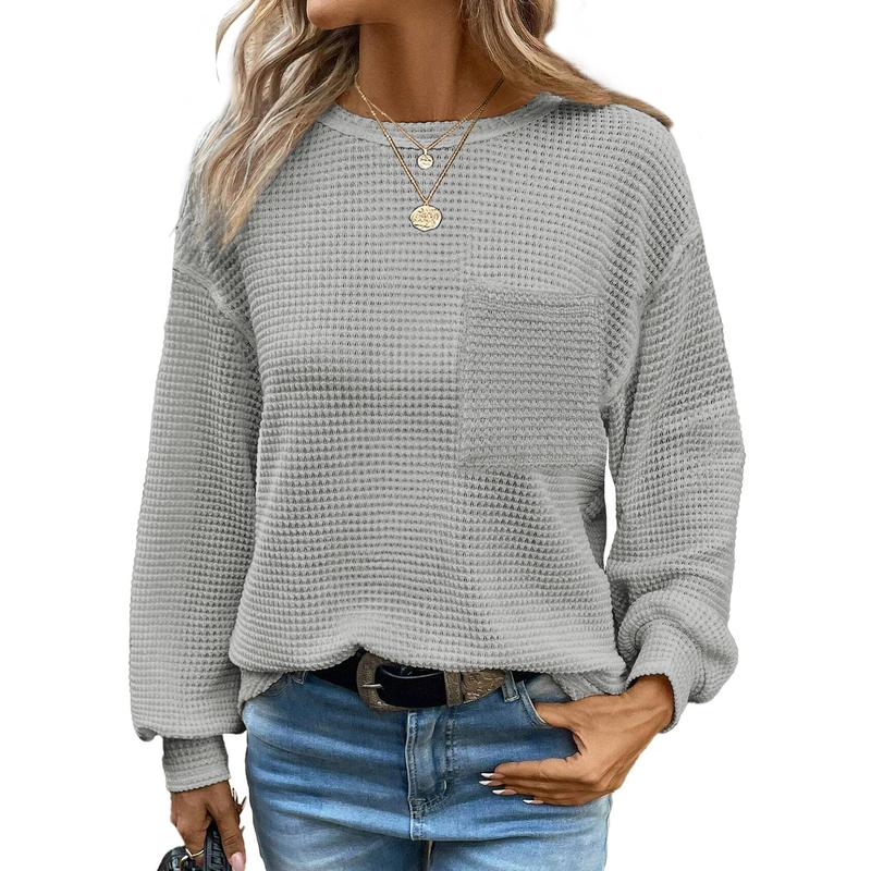 Relaxed fit women's oversized long sleeve crewneck blouse, an essential versatile top for colder seasons.