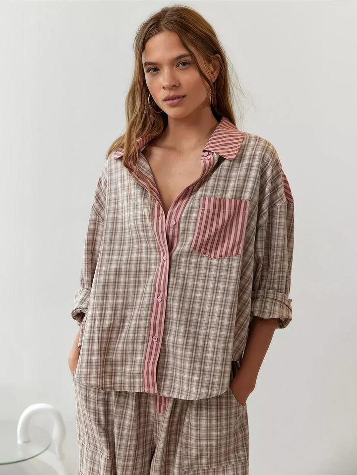 Women's cozy plaid button-up pajama set. Relaxed fit shirt & pants for comfortable loungewear and sleep.