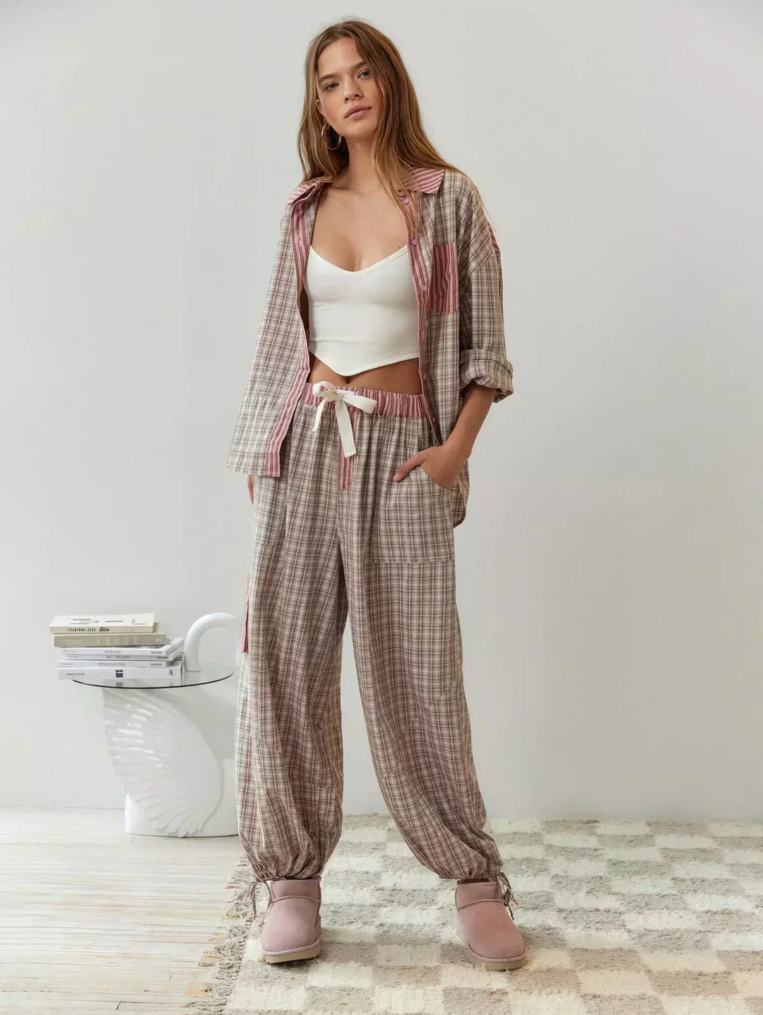 Women's relaxed fit plaid pajama set with button-up top and comfortable pants. Perfect for sleep & home wear.