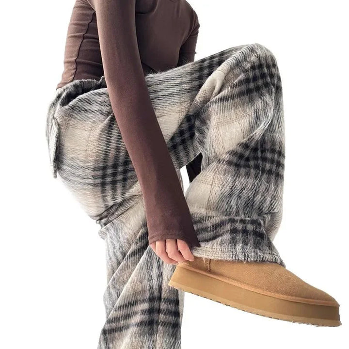 Soft women's plaid lounge pants, wide-leg design for cozy, relaxed everyday comfort.