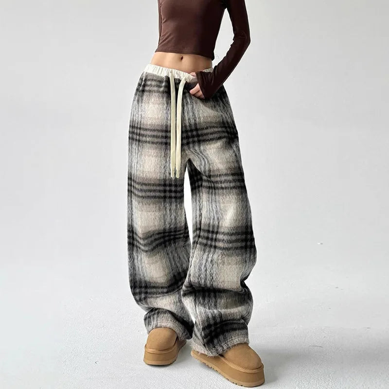 Ultra-comfortable women's plaid wide-leg lounge pants for a relaxed fit and cozy casual style.
