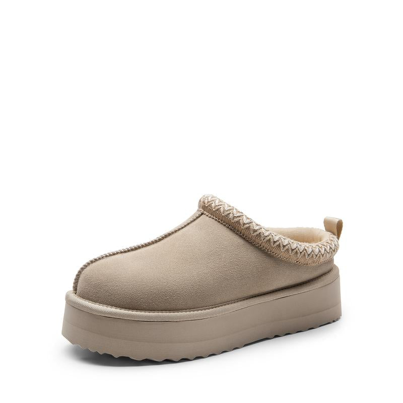 Comfortable slip-on platform house slippers for women, cushioned for everyday wear.