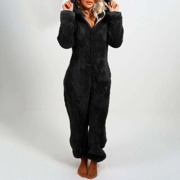 Stylish women's plush onesie pajama. Super soft, hooded loungewear designed for cozy relaxation at home.