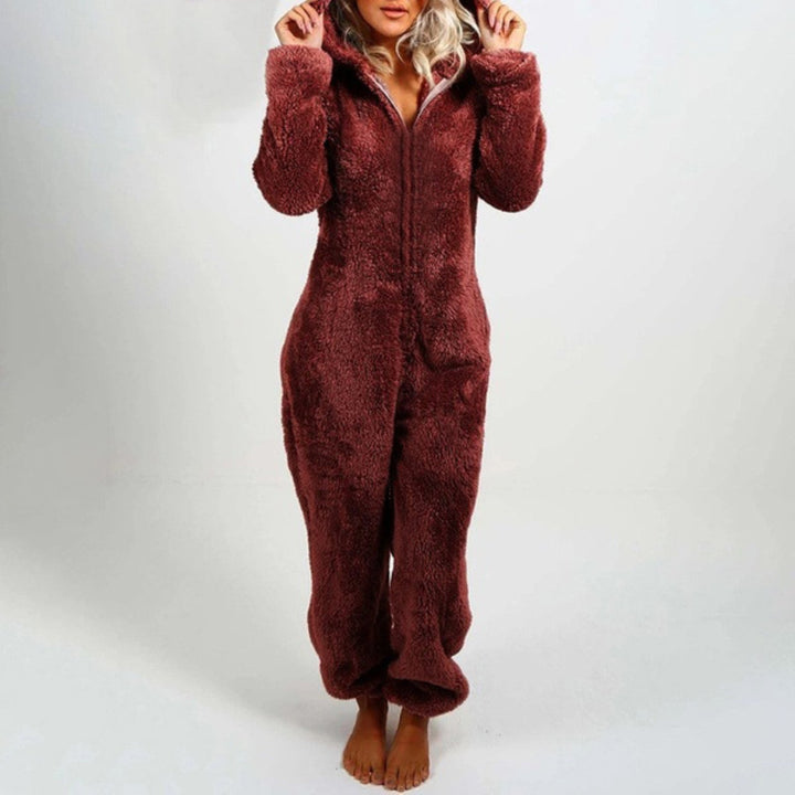 Comfortable women's plush hooded onesie pajama, perfect for cold weather. Soft loungewear for ultimate relaxation.