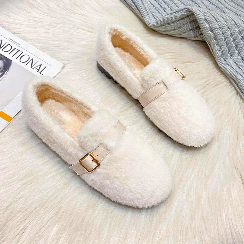 Warm women's plush-lined slip-on flats, perfect for cozy winter & fall fashion, providing ultimate comfort.
