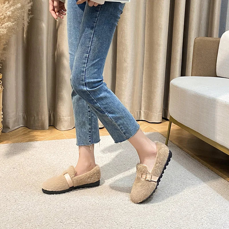 Soft & comfortable women's plush-lined flats with a durable sole, ideal for cozy fall and winter casual wear.
