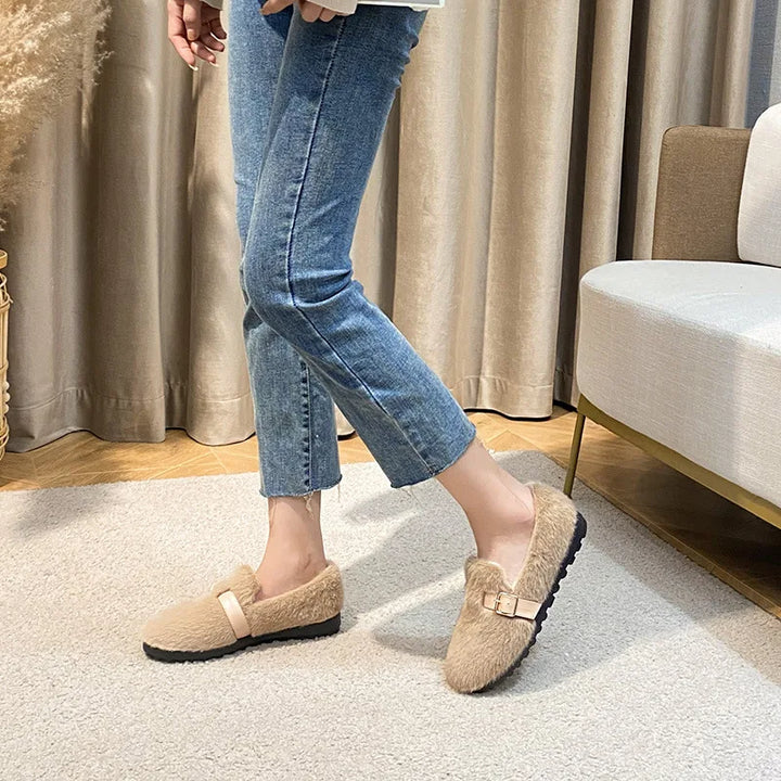 Soft & comfortable women's plush-lined flats with a durable sole, ideal for cozy fall and winter casual wear.
