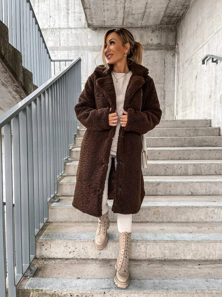Oversized plush teddy trench coat for women, a stylish longline jacket for fall and winter fashion.