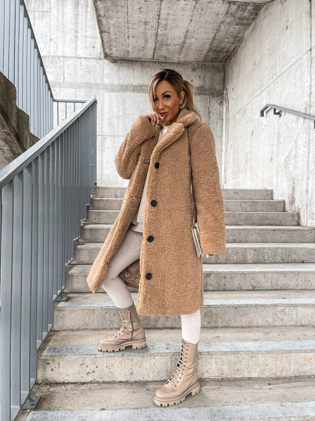 Cozy women's plush jacket, a longline teddy trench coat offering warmth and elegant outerwear.