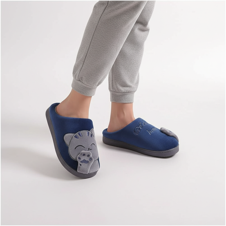 Side view of warm women's slippers, black, featuring a non-slip sole for indoor safety