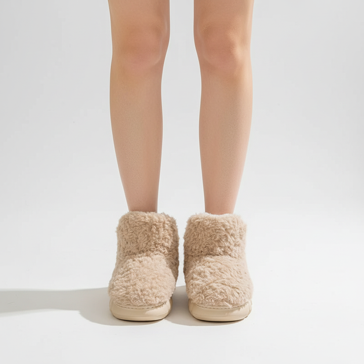 Close-up of the non-slip sole on women's WarmStep indoor-outdoor plush slippers, flat heel