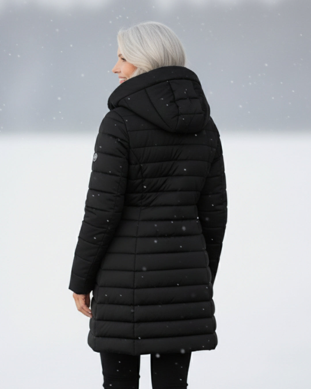 Women's winter puffer jacket, stylish outerwear offering cozy warmth.