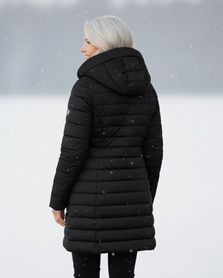 Women's winter puffer jacket, stylish outerwear offering cozy warmth.
