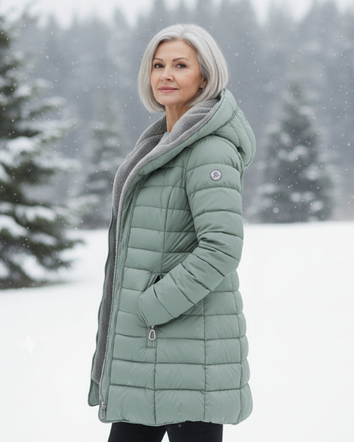 Stylish green women's puffer jacket, warm winter outerwear.