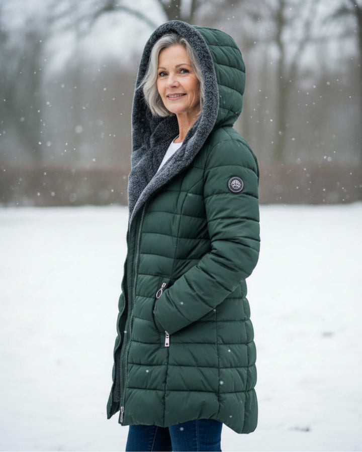 Women's green puffer coat, warm outerwear for stylish everyday wear.