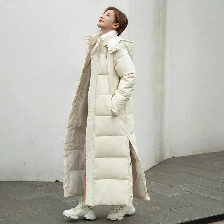 Stylish women's quilted long coat, versatile outerwear for winter layering & daily wear in cold temperatures.