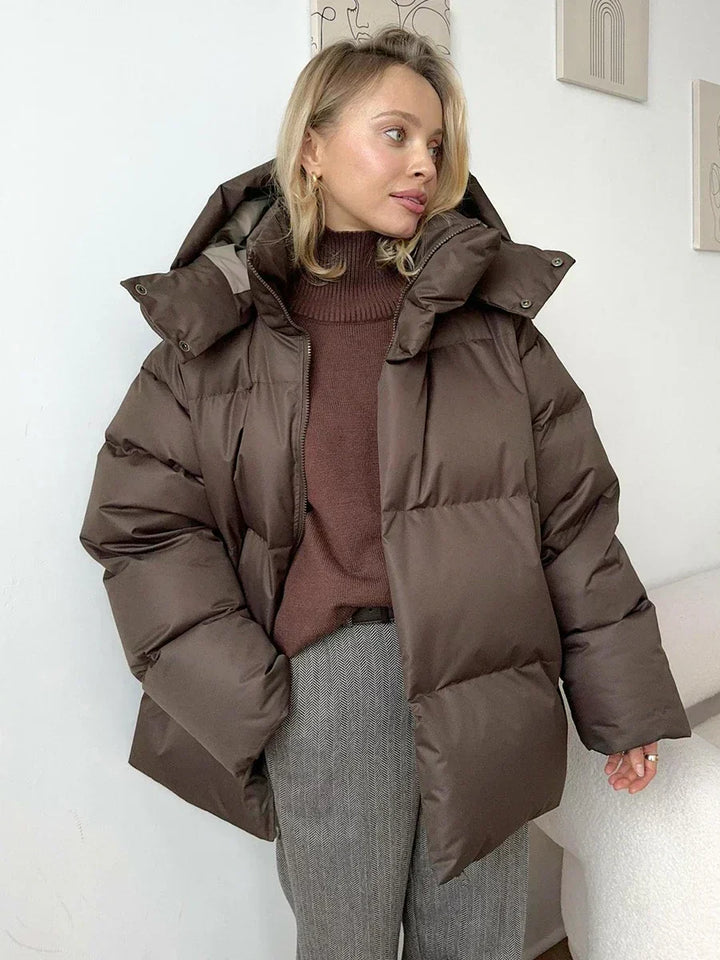 Women's cozy quilted winter coat, perfect for cold weather & everyday wear. Stylish long sleeve outerwear.