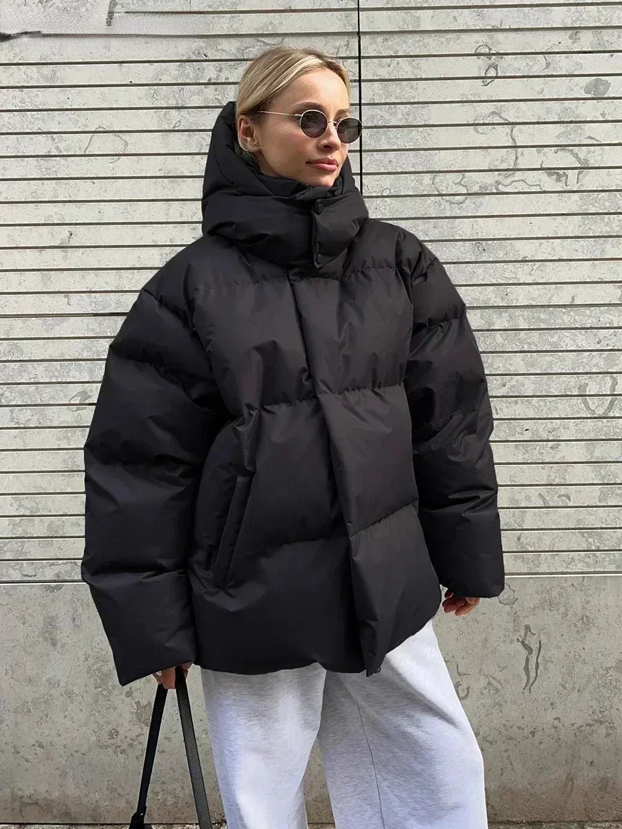 Fashionable women's quilted winter coat. Stay warm & stylish in cold weather with this cozy long sleeve jacket.