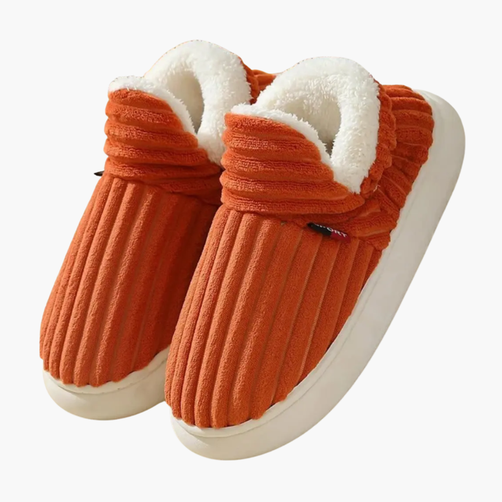 Women's cozy ribbed bootie slippers for warm home comfort and relaxation.