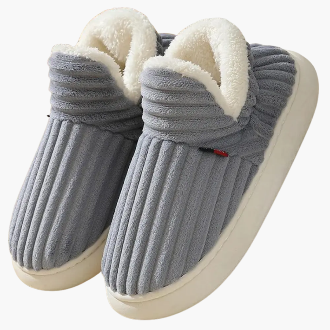 Stylish women's ribbed bootie slippers, offering ultimate coziness for warm indoor house shoes.