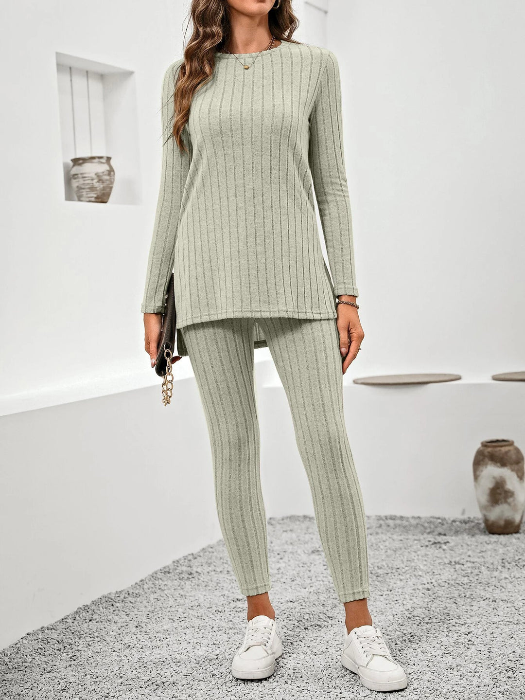 Back view of a woman wearing a comfortable ribbed knit lounge set, showing the tunic top's relaxed fit.
