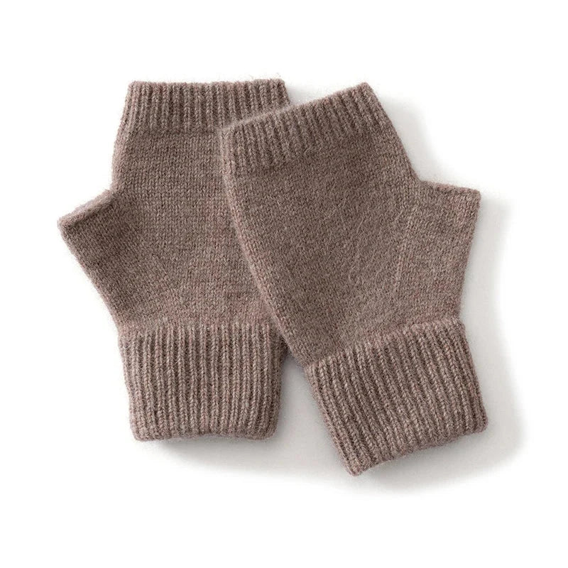 Stylish women's fingerless wool gloves with ribbed cuffs, providing cozy warmth and comfort.