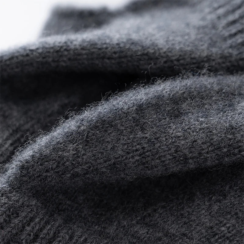 Women's practical wool fingerless gloves, perfect for typing or staying warm while active.