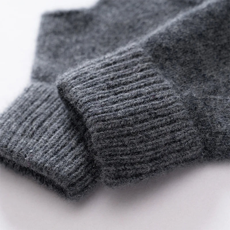 Hand wearing women's warm wool fingerless gloves, showing excellent finger dexterity for tasks.