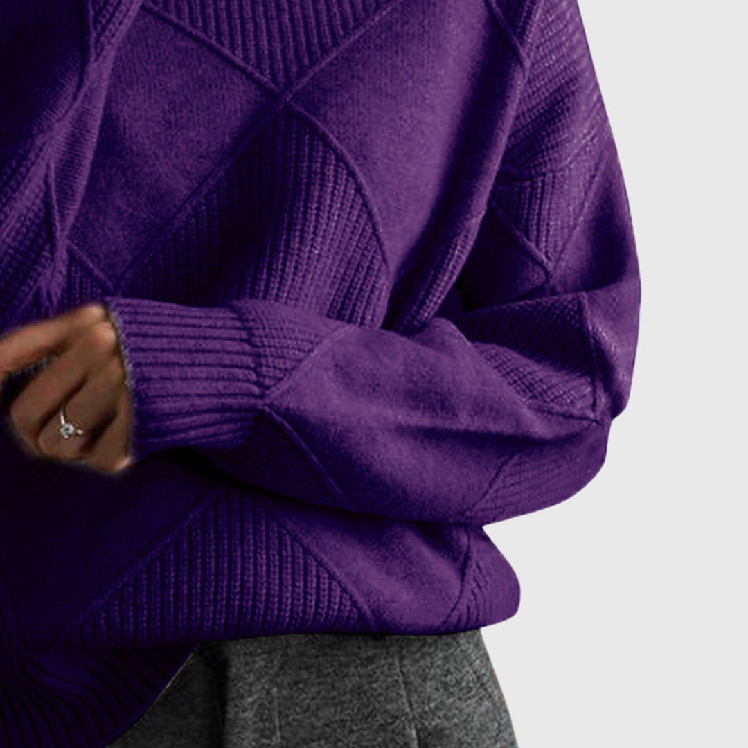 Woman in relaxed fit roll neck sweater, showing graceful long sleeves & cozy knit.