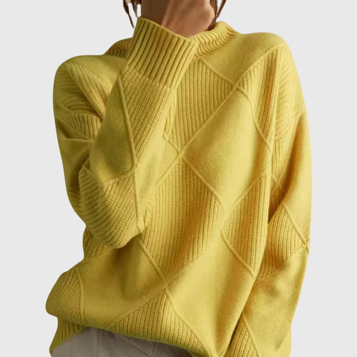Rich texture of a cozy knit women's roll neck sweater, perfect for warm winter style.