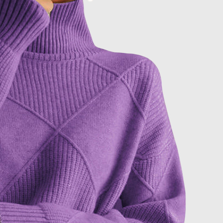 Stylish diagonal seam detail on a women's long sleeve cozy knit pullover.