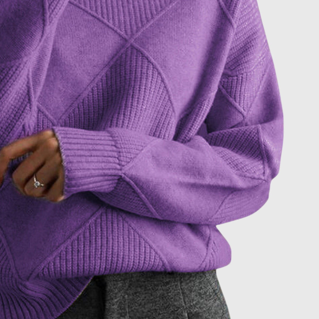Relaxed fit women's roll neck sweater, showing full back and elegant drape.