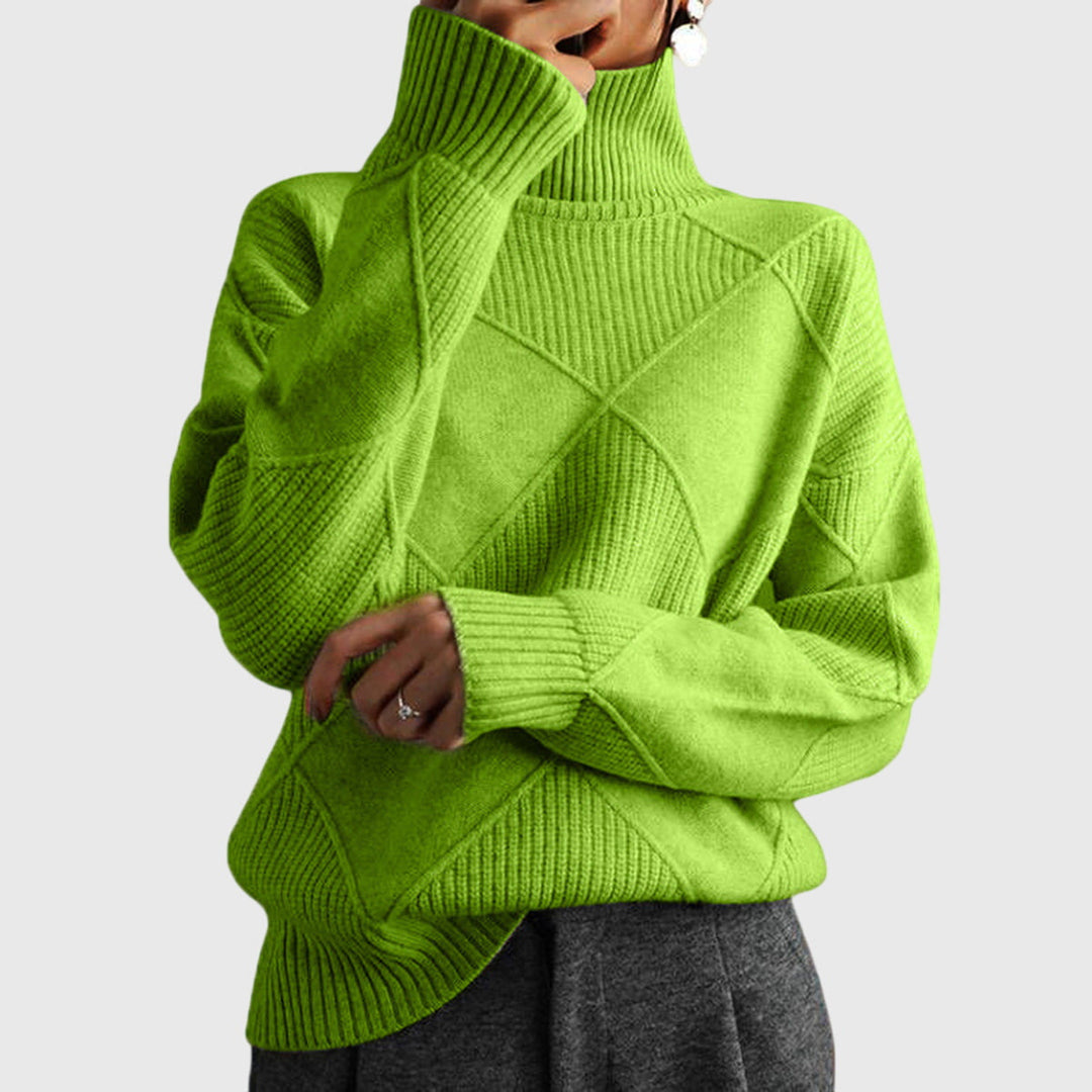 Woman wearing cozy roll neck sweater, showcasing its relaxed fit and winter style.