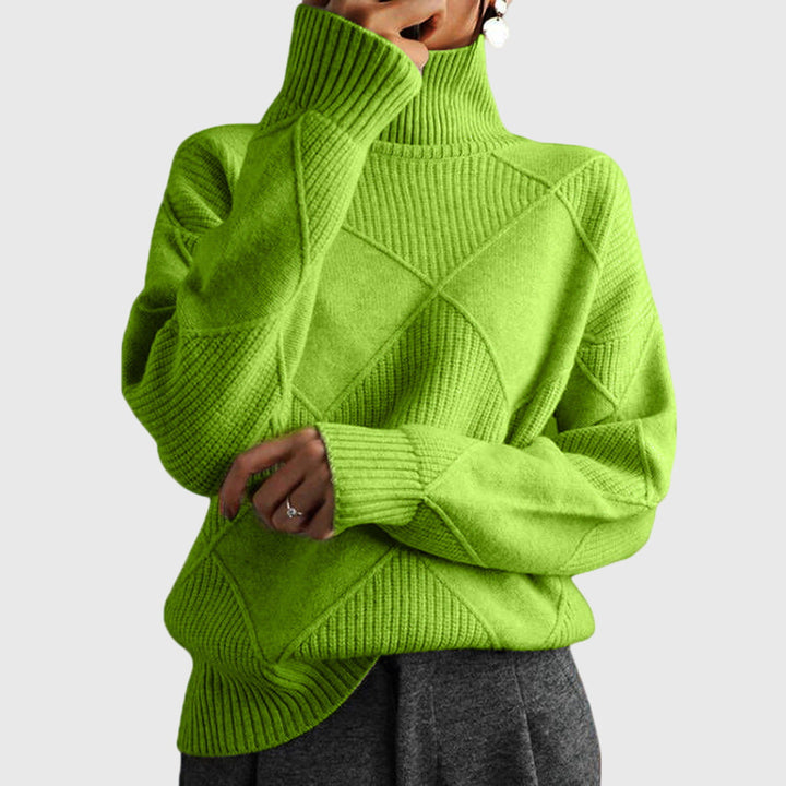 Woman wearing cozy roll neck sweater, showcasing its relaxed fit and winter style.