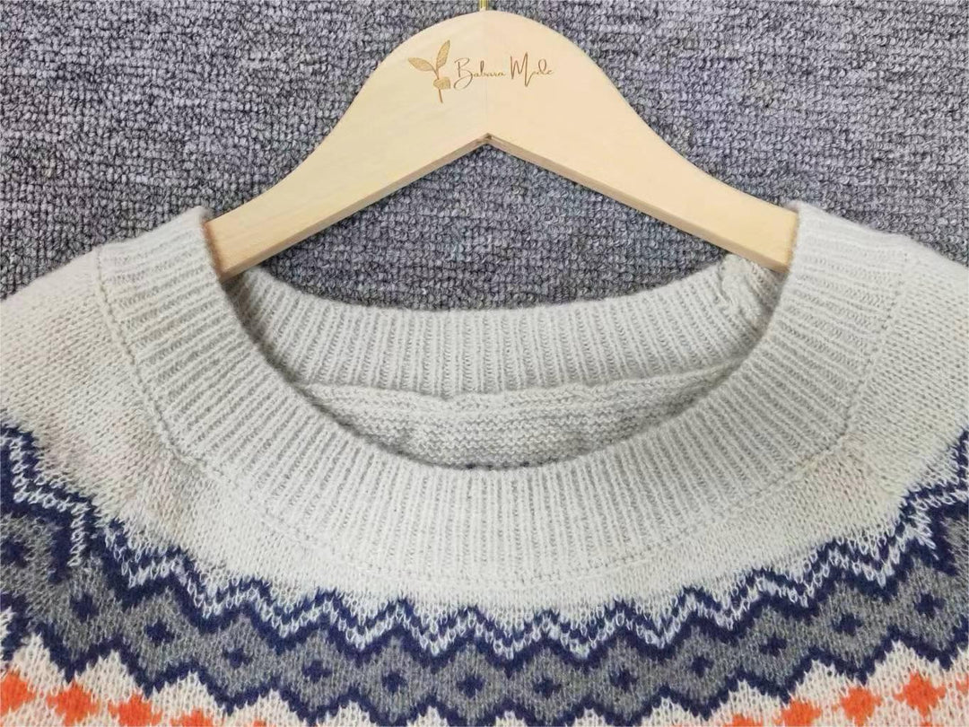 Women's casual Scandinavian sweater, cozy & trendy patterned knit top.