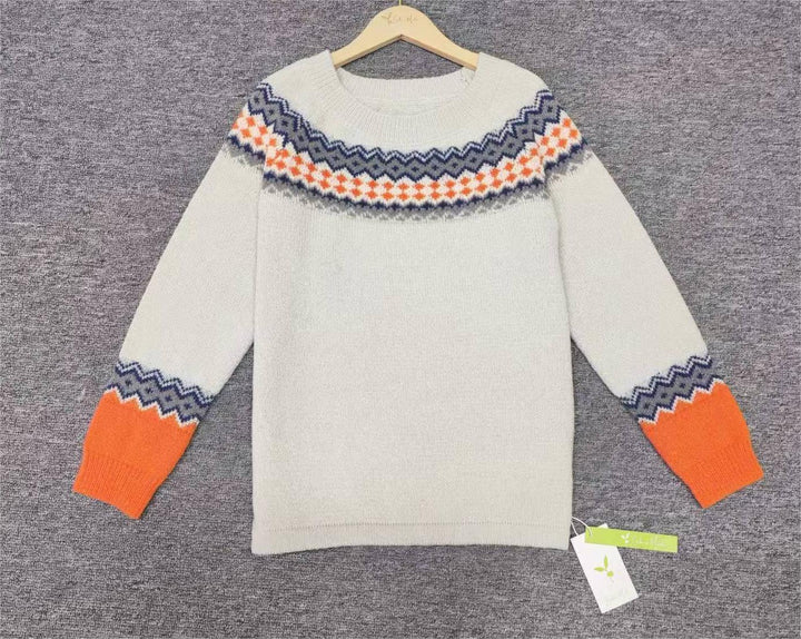 Comfortable long sleeve women's Scandinavian sweater, vibrant patterned knit.