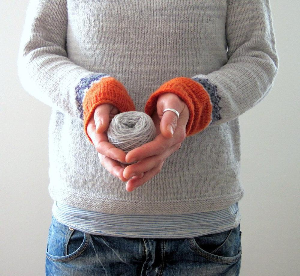 Cozy women's Scandinavian sweater, vibrant knit pattern, ideal for fall & winter.