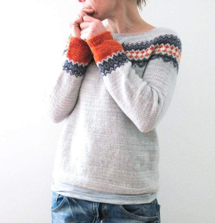 Stylish women's patterned knit top, Scandinavian design, comfortable long sleeve.