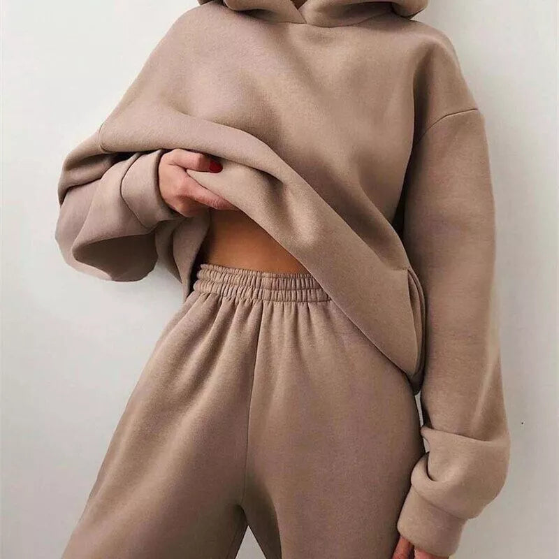 Soft Midnight Black women's athleisure set, featuring an oversized hoodie and relaxed fit joggers for ultimate comfort.
