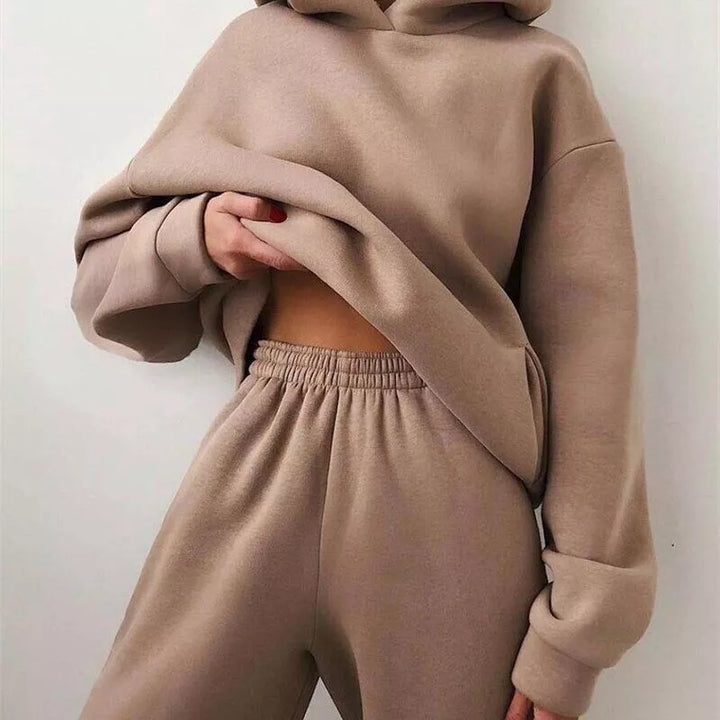 Soft Midnight Black women's athleisure set, featuring an oversized hoodie and relaxed fit joggers for ultimate comfort.