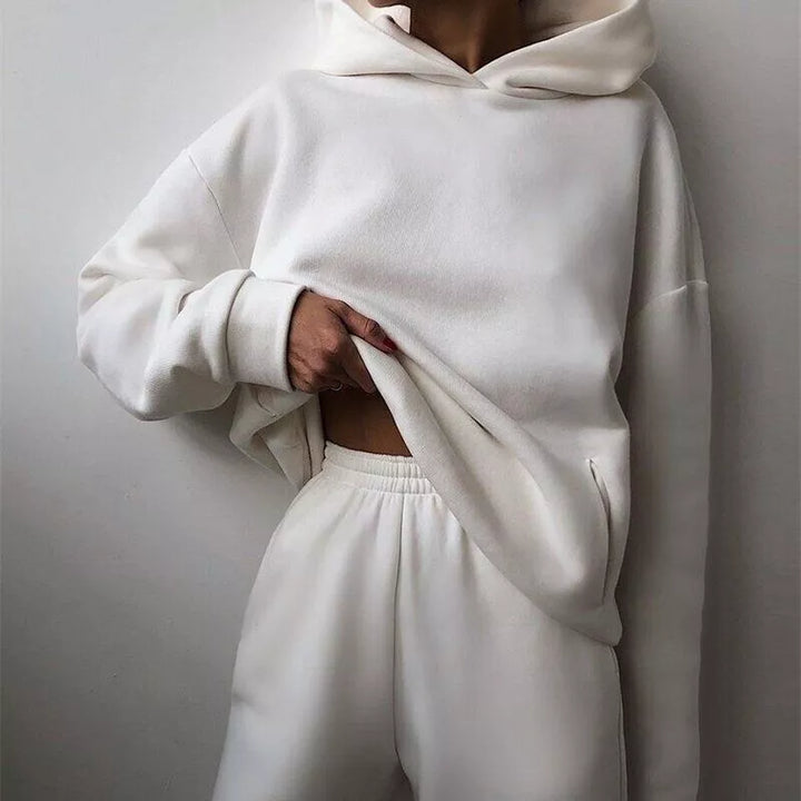 Women's Serenity lounge set: a comfy relaxed fit hoodie and jogger combination in soft Midnight Black fabric.