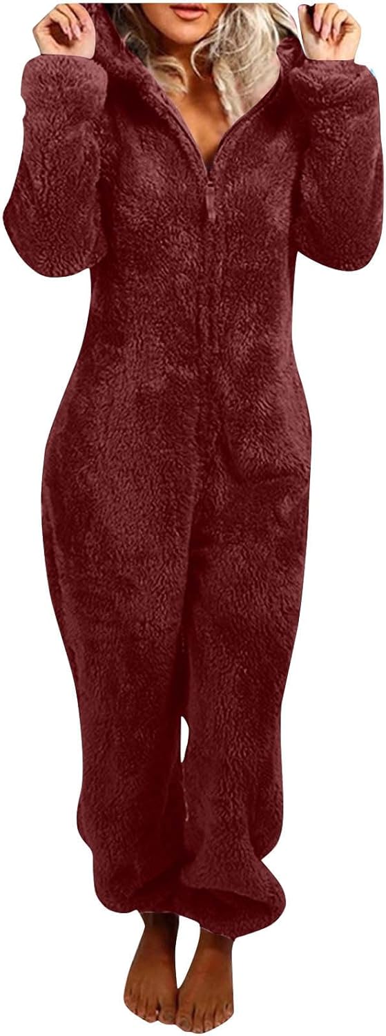 Women's cozy sherpa fuzzy onesie with hood, perfect for winter comfort & relaxation.