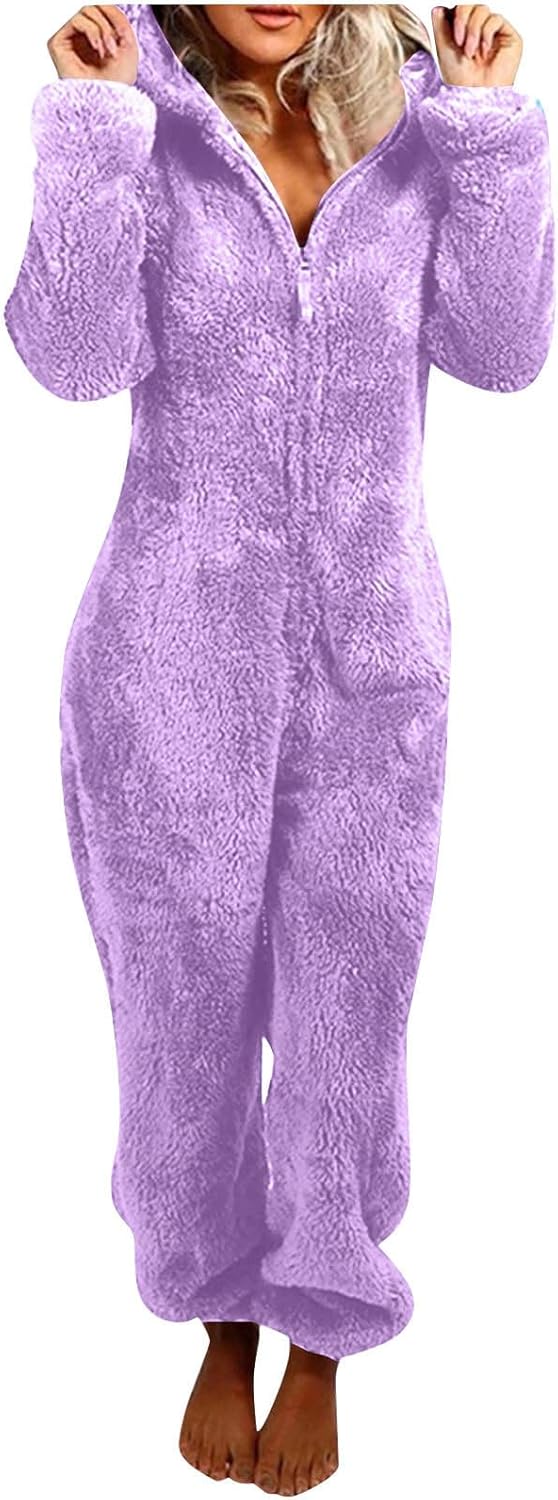 Women's hooded sherpa onesie, fuzzy & warm, perfect for cold weather sleep.