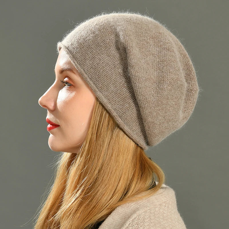 Women's cozy slouch beanie for chic winter warmth. Stylish knit hat, perfect for cold weather & casual wear.