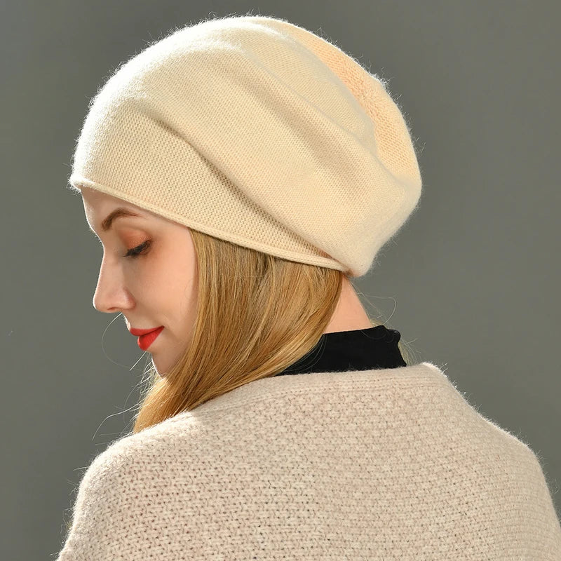 Soft knit women's beanie, a warm and cozy slouchy hat for stylish winter headwear and cold weather.