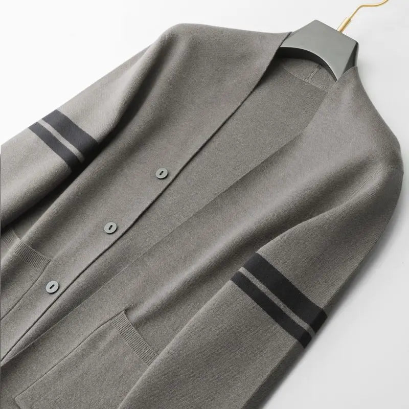 Casual women's striped cardigan in a classic design. Warm, soft sweater for effortless layering and everyday fashion.